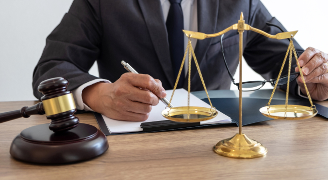 Lawbooks Inside a Book Shelf - Zayouna Law Firm