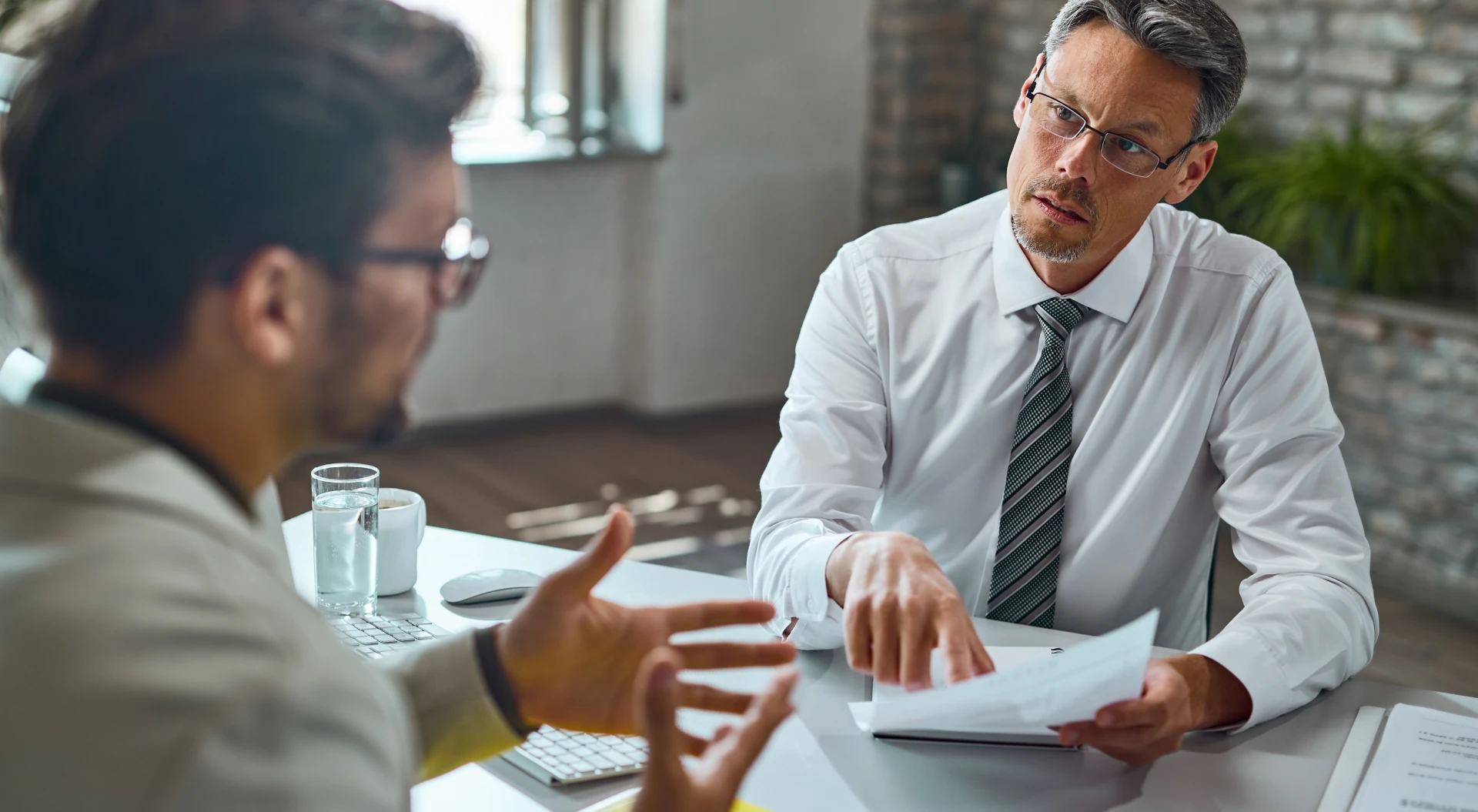 Joseph Zayouna personal injury lawyer consulting with injured Ontario accident benefits client about IME process